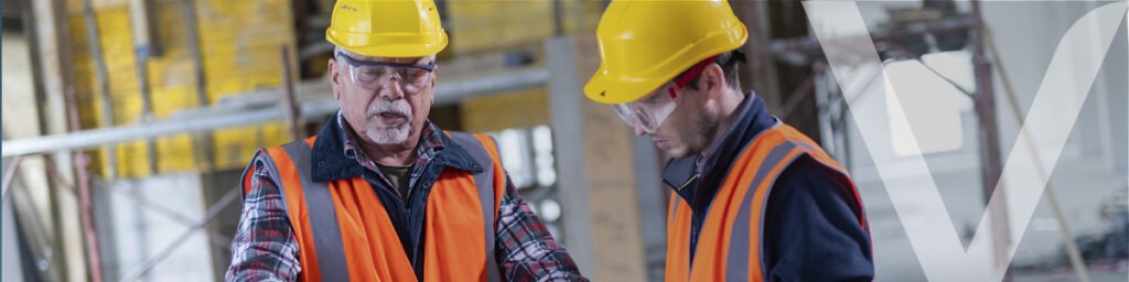 A construction site hard hat, representing compliance with construction safety